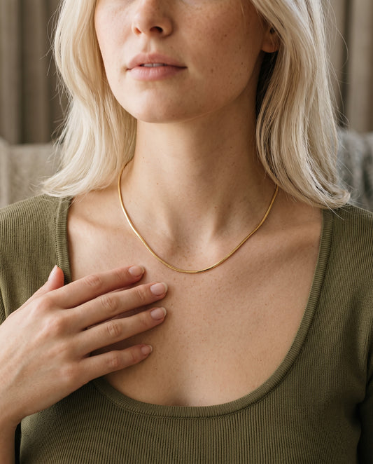 Gold Filled 1.3mm Square Snake Necklace worn by a model