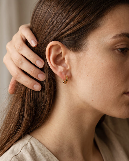 Gold Filled 10mm Hoops worn by a model