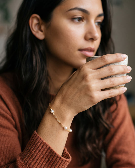Gold Filled Figaro Pearl Bracelet worn by a model
