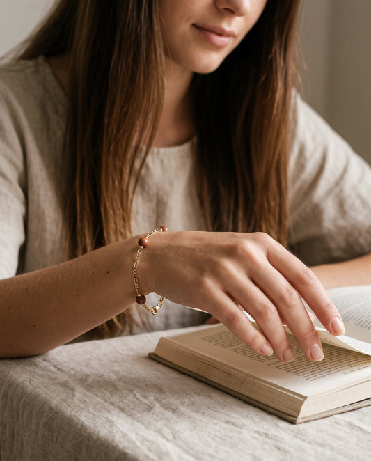 Gold Filled Sandstone Figaro Bracelet worn by a model