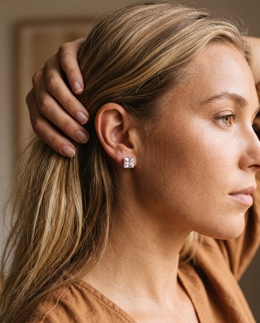 Sterling Silver 8mm CZ Stud Earrings worn by a model