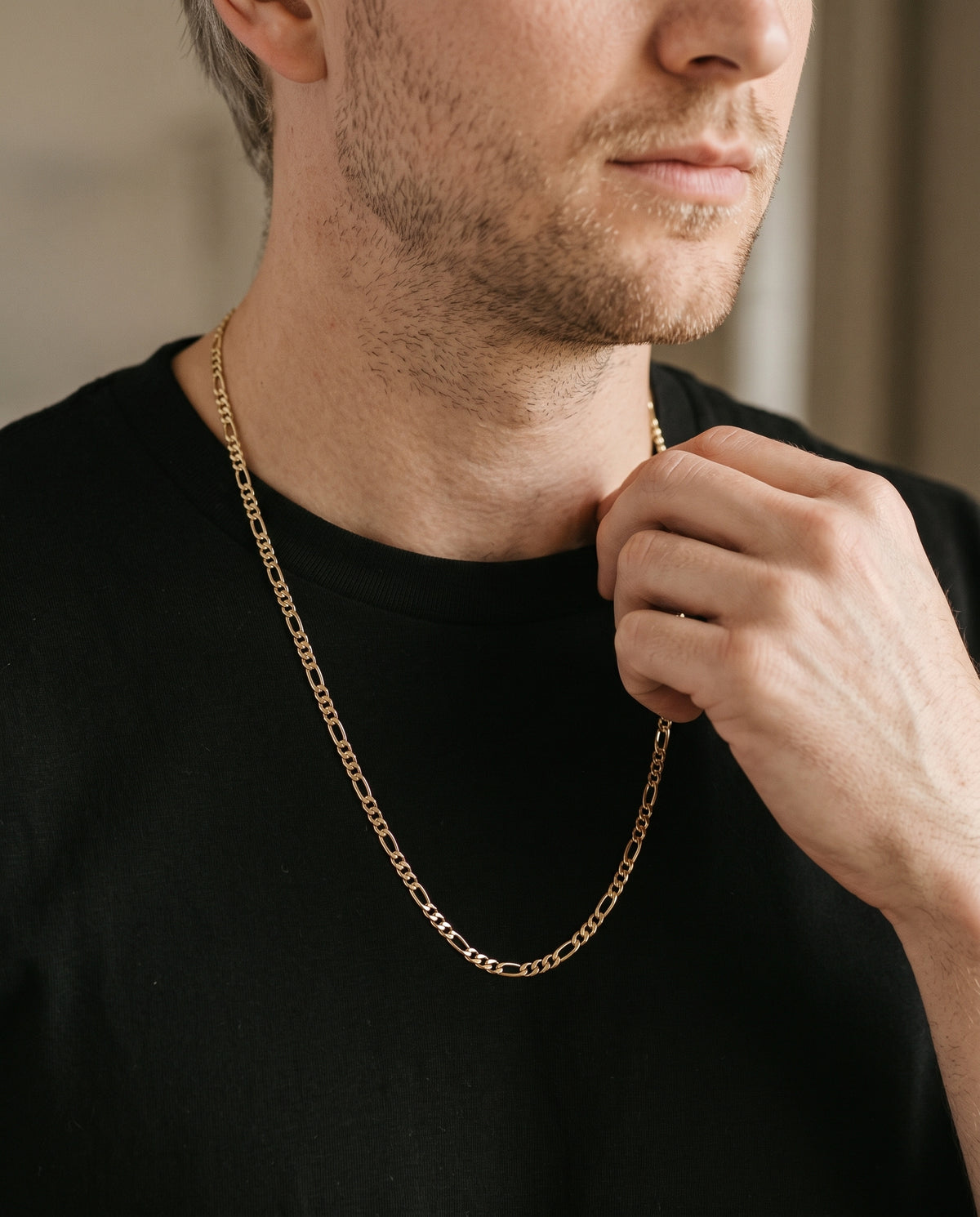 Gold Filled 2.5mm Figaro Chain worn by a model