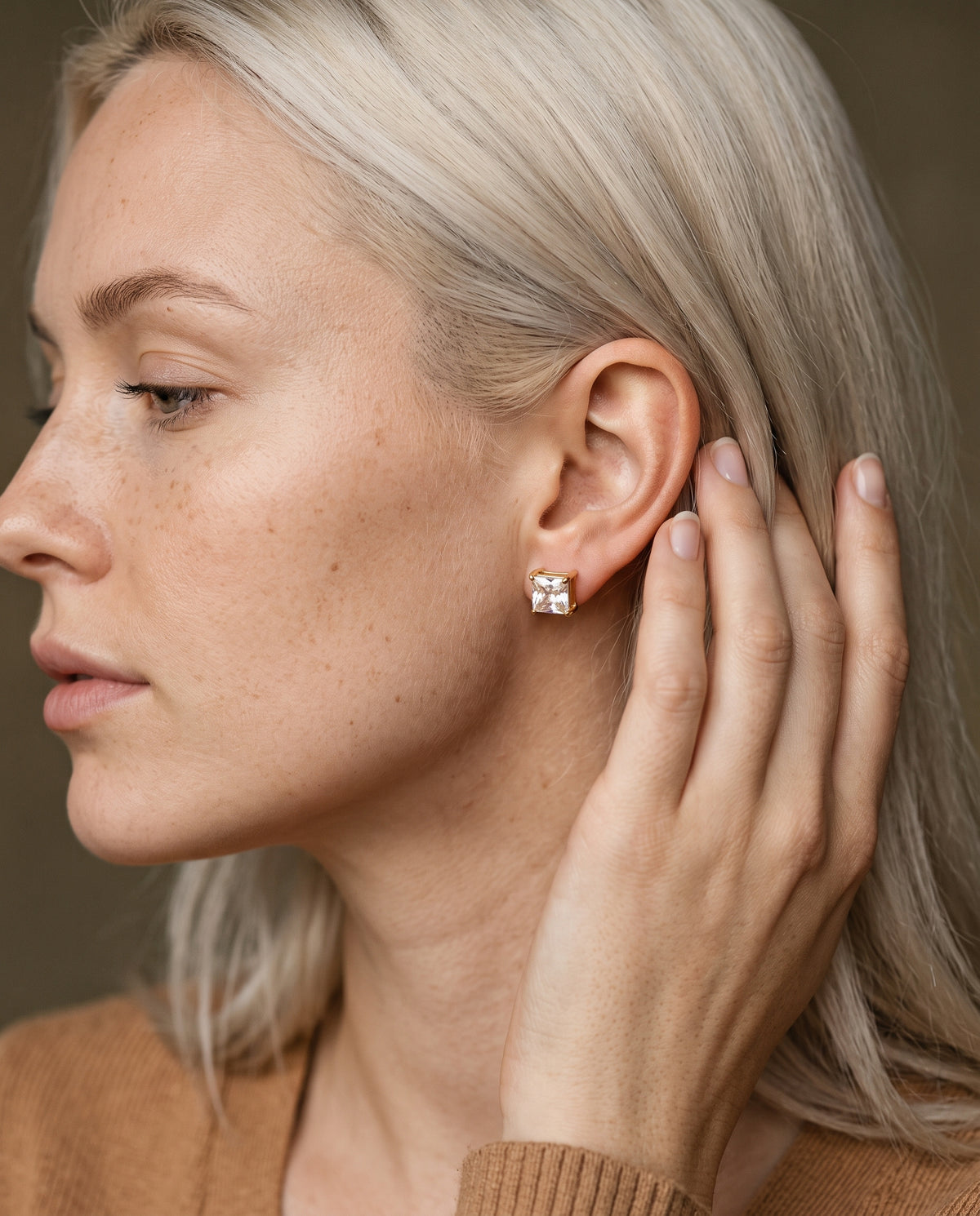 Gold Filled 8mm CZ Princess Cut Stud Earrings worn by a model