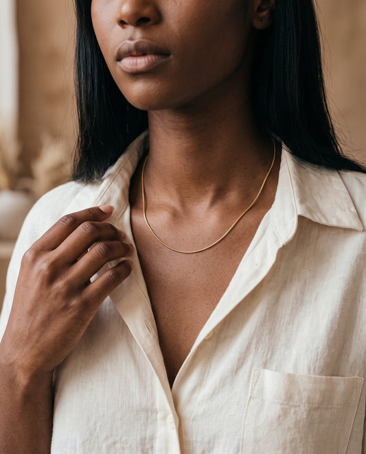 Gold Filled 0.5mm Snake Chain Necklace worn by a model