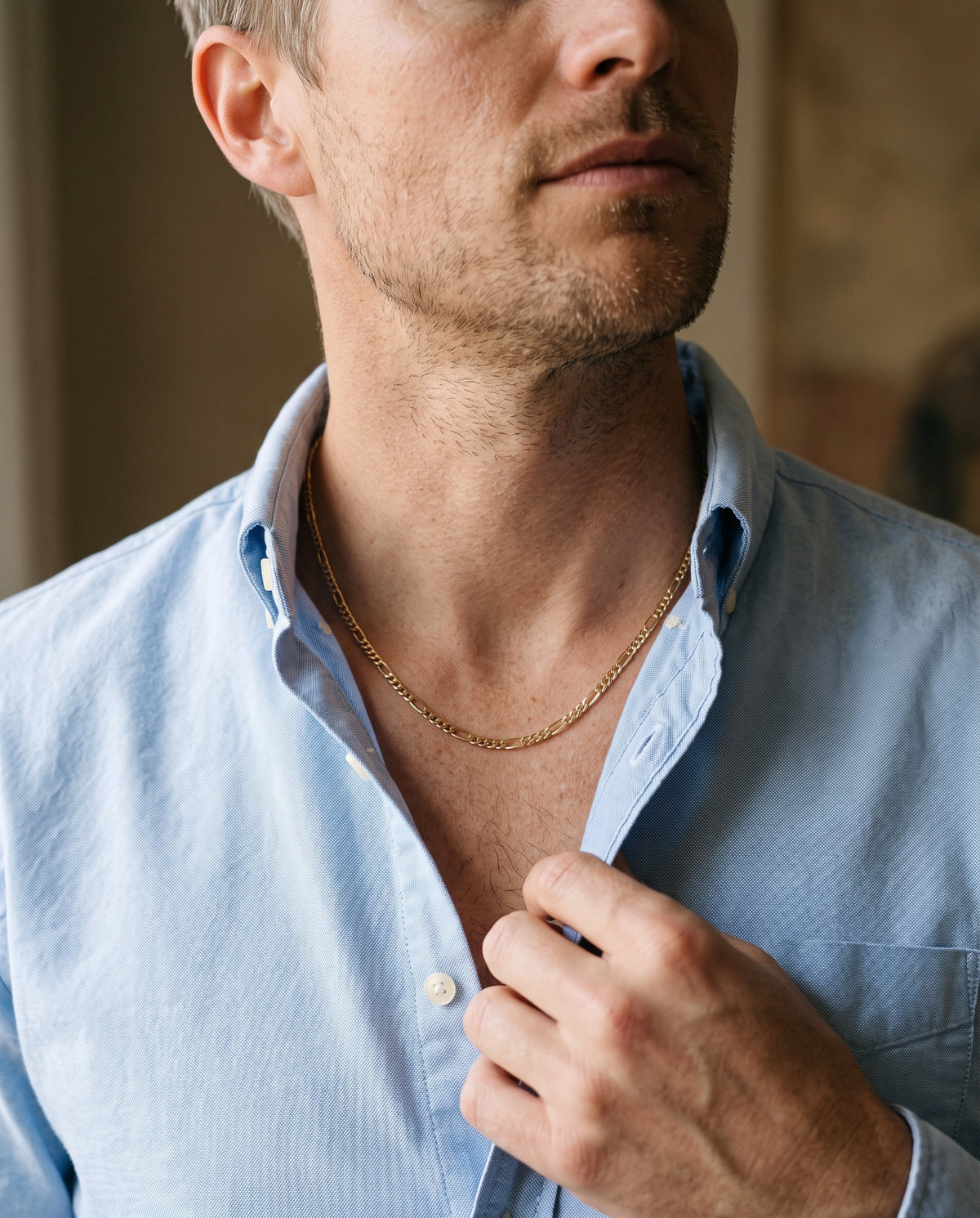 Gold Filled 0.9mm Figaro Chain worn by a model