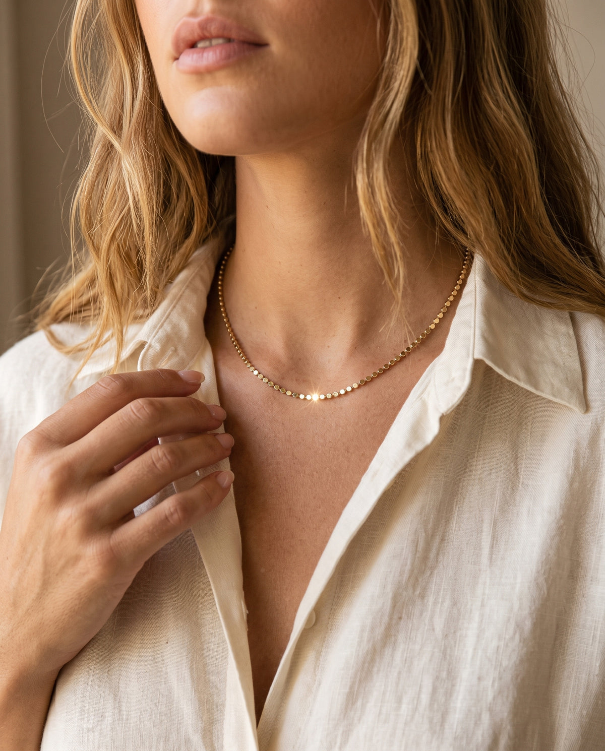 Gold Filled 1.5mm Flat Ball Necklace worn by a model