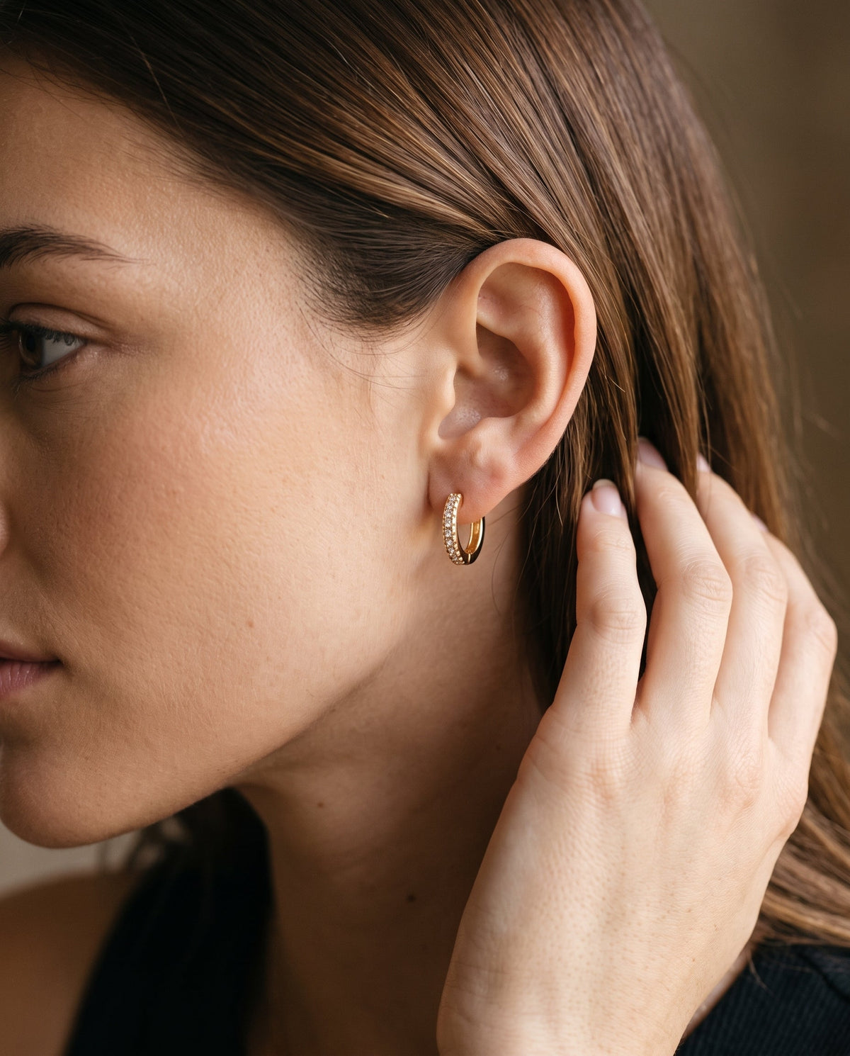 Gold Filled 11mm Mini CZ Hoops worn by a model