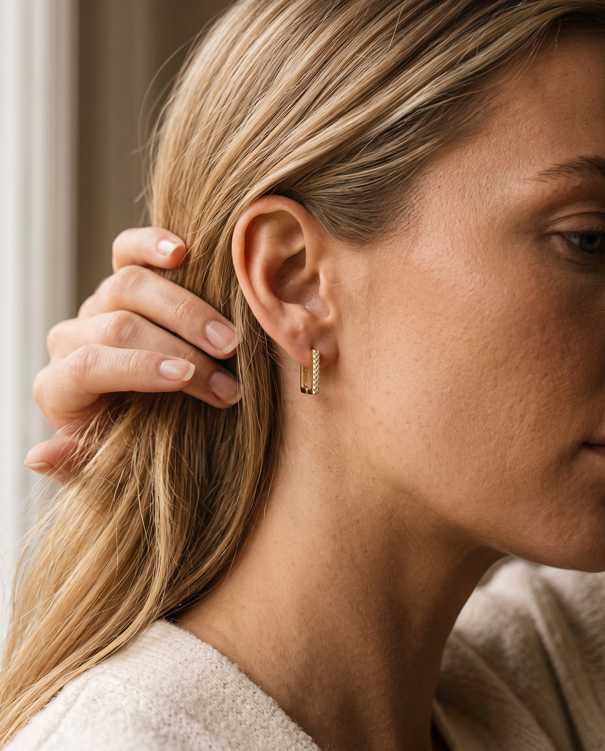 Gold Filled 11mm Mini Square CZ Hoops worn by a model
