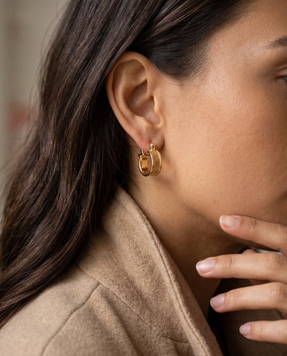 Gold Filled 13mm Hoops worn by a model
