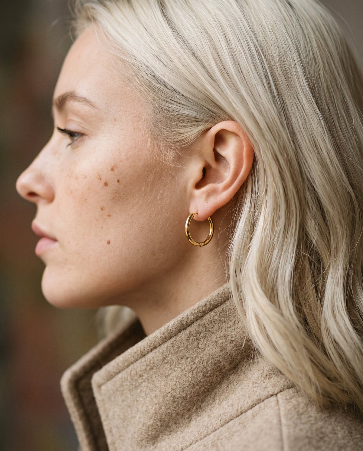 Gold Filled 14mm Hoop Earrings worn by a model