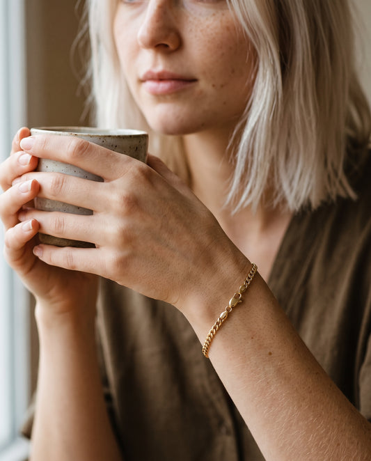 Gold Filled 2mm Curb Bracelet worn by a model