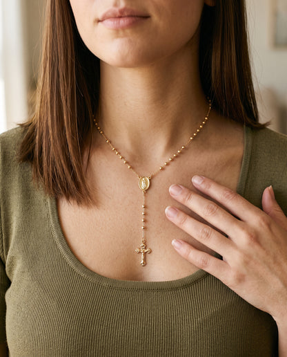 Gold Filled 2mm Stardust Our Lady of Guadalupe Rosary worn by a model