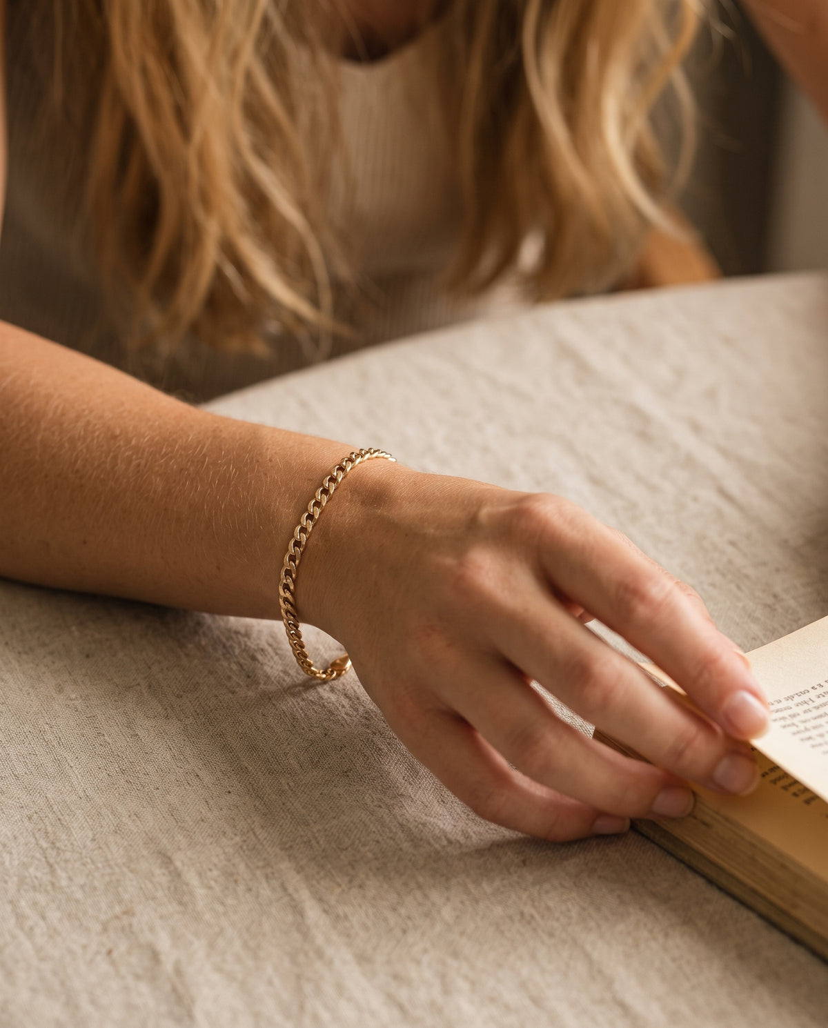 Gold Filled 3mm Beveled Curb Bracelet worn by a model
