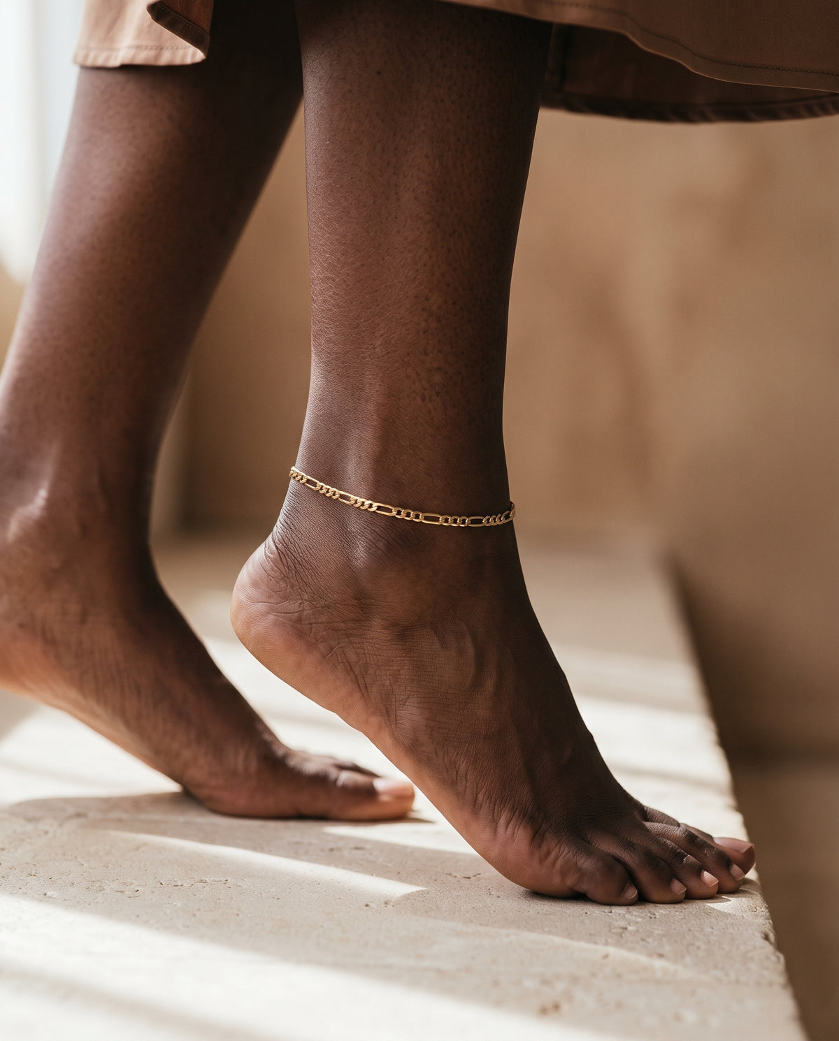 Gold Filled 3mm Flat Figaro Anklet worn by a model