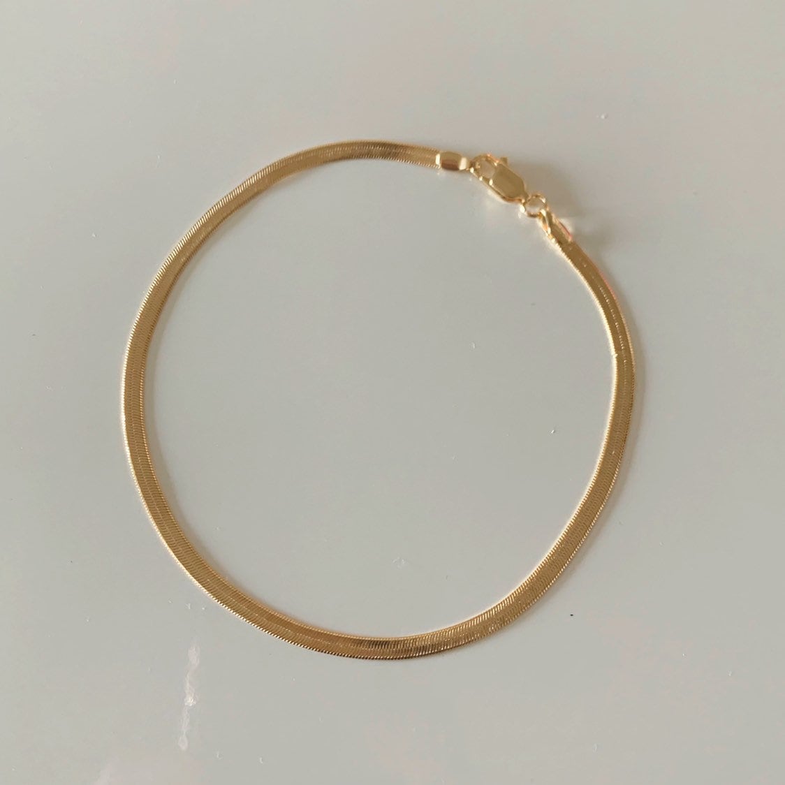 18KT Gold Filled Anklets, Gold Filled 3mm Herringbone Anklet | Sleek Flat Chain Shine by HAUS OF MONOGRAM