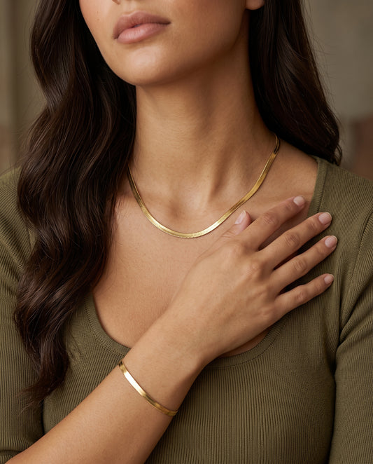 Gold Filled 3mm Herringbone Set worn by a model