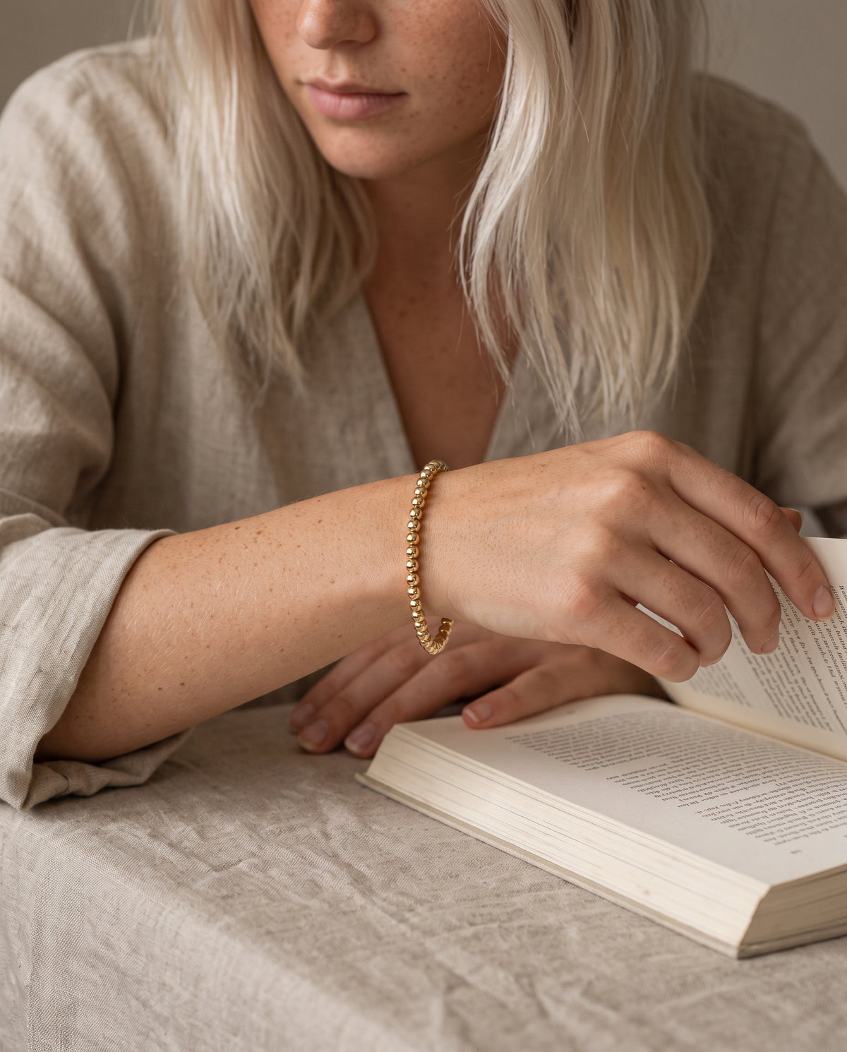 Gold Filled 4mm Beaded Bracelet worn by a model