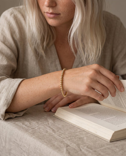 Gold Filled 4mm Beaded Bracelet worn by a model