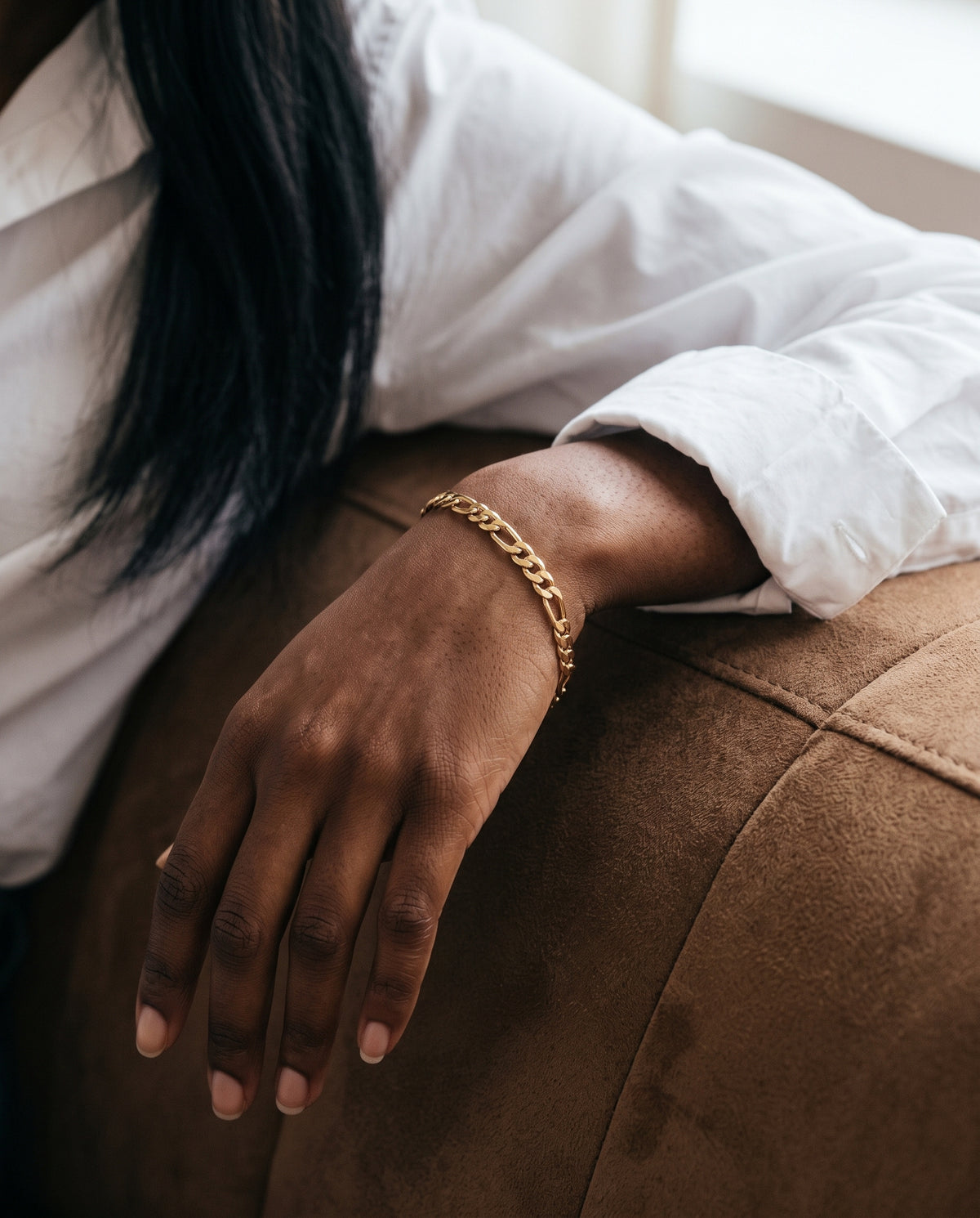 Gold Filled 4mm Flat Figaro Bracelet worn by a model