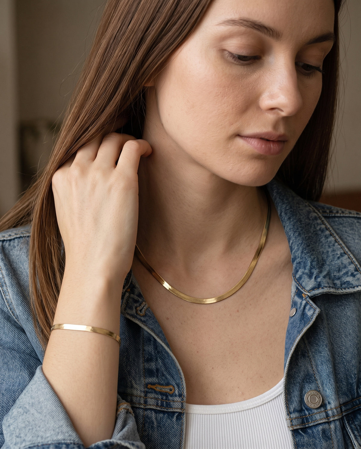 Gold Filled 4mm Herringbone Set worn by a model
