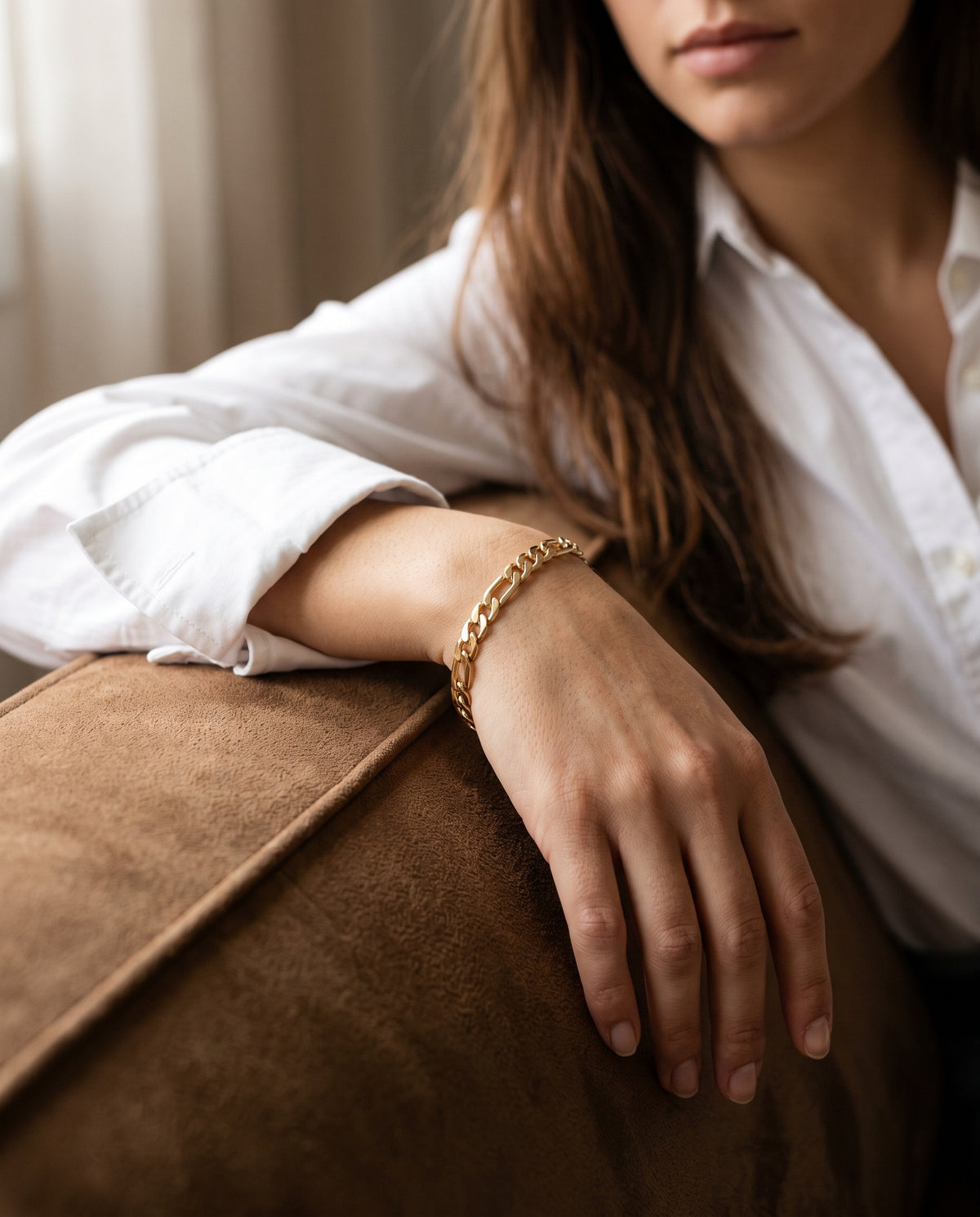 Gold Filled 7mm Figaro Bracelet worn by a model