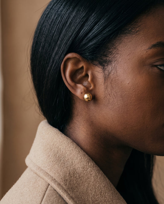 Gold Filled 9mm Stud Earrings worn by a model