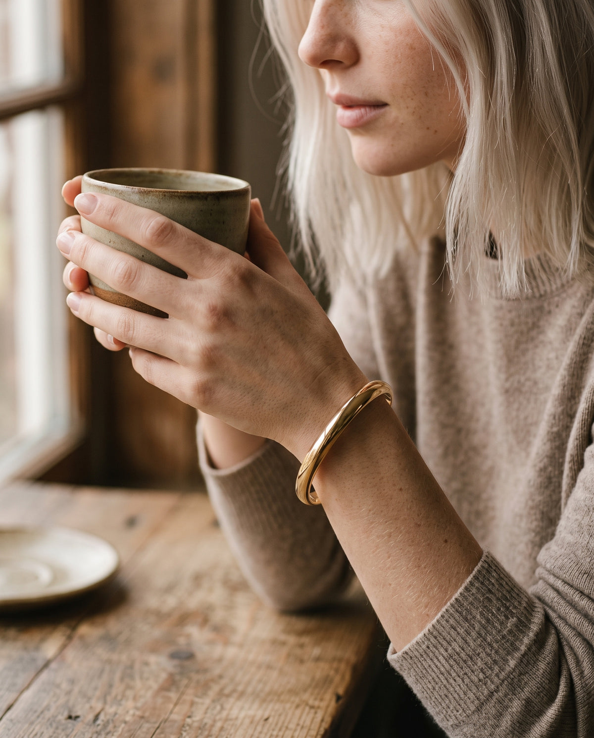 Gold Filled Adjustable Bangle worn by a model