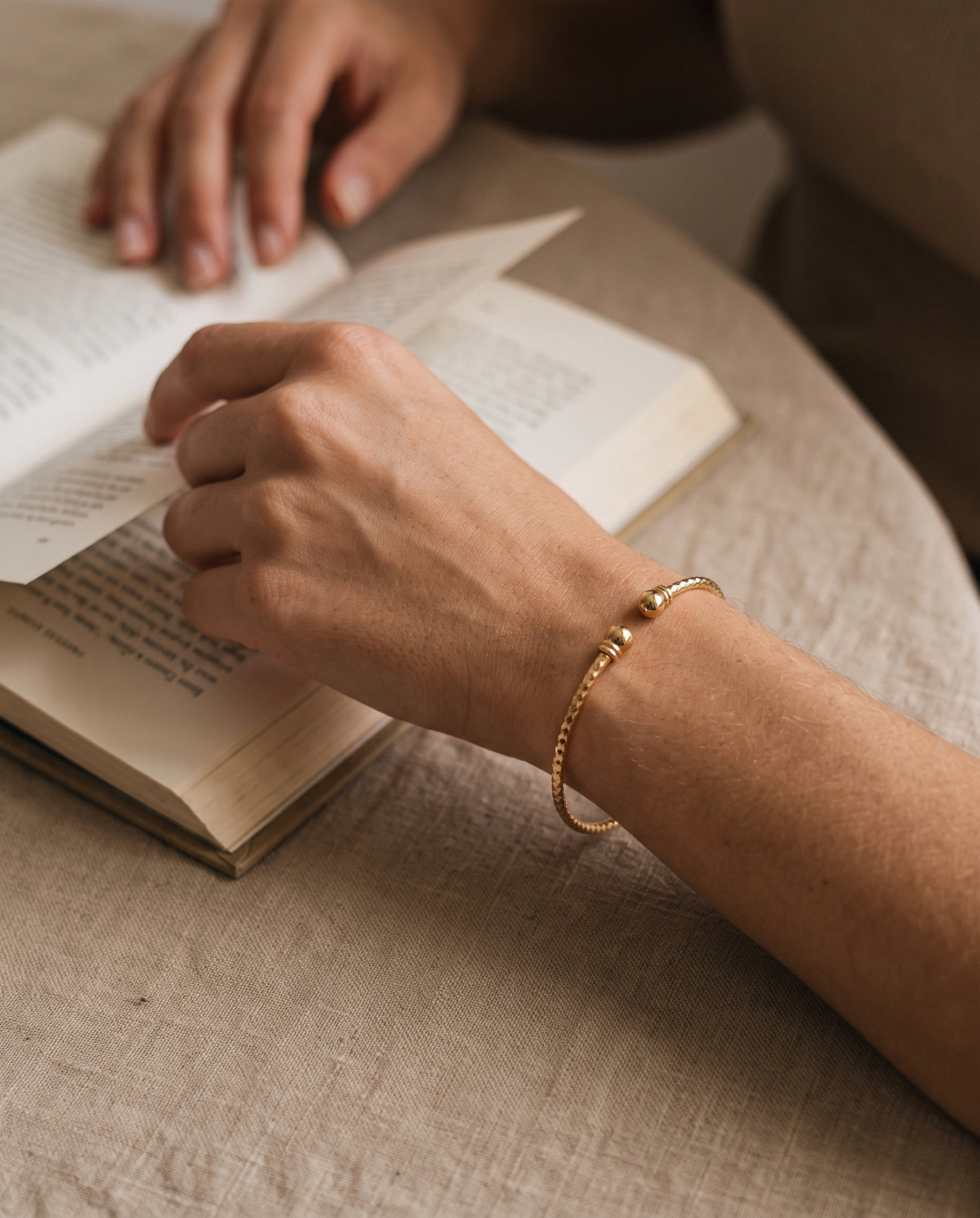 Gold Filled Adjustable Bangle worn by a model