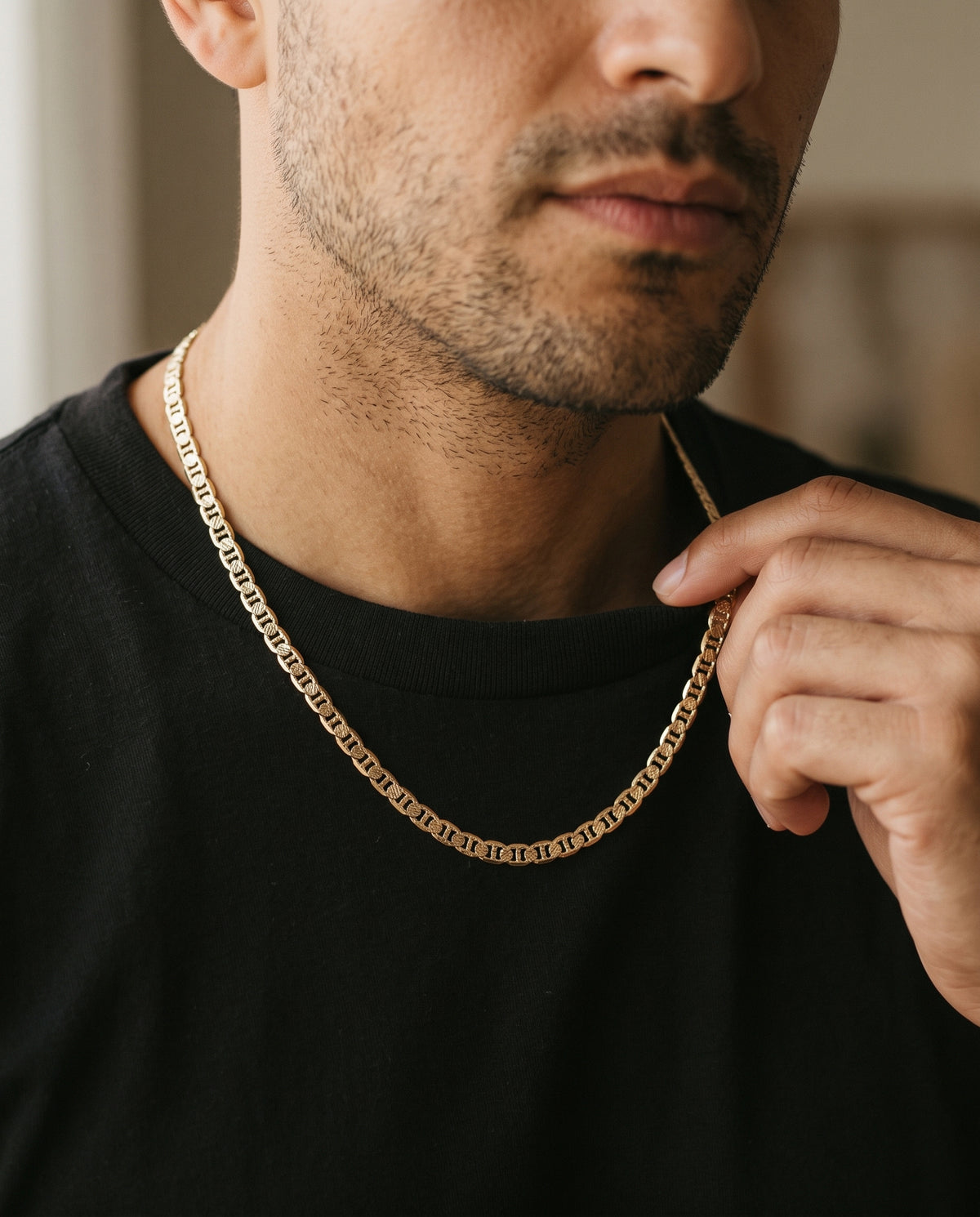 Gold Filled Beveled Mariner Chain worn by a model