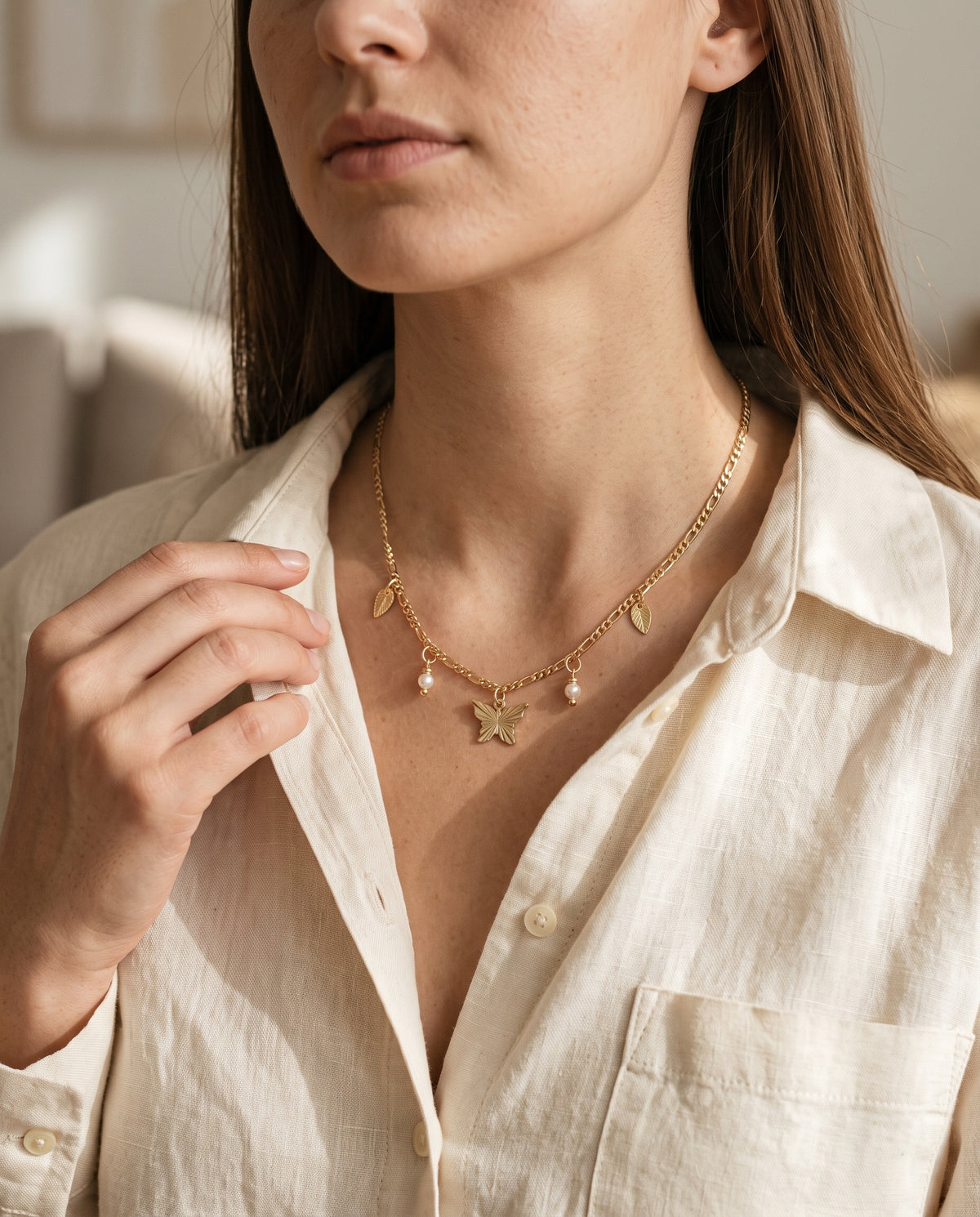 Gold Filled Butterfly Charm Necklace worn by a model