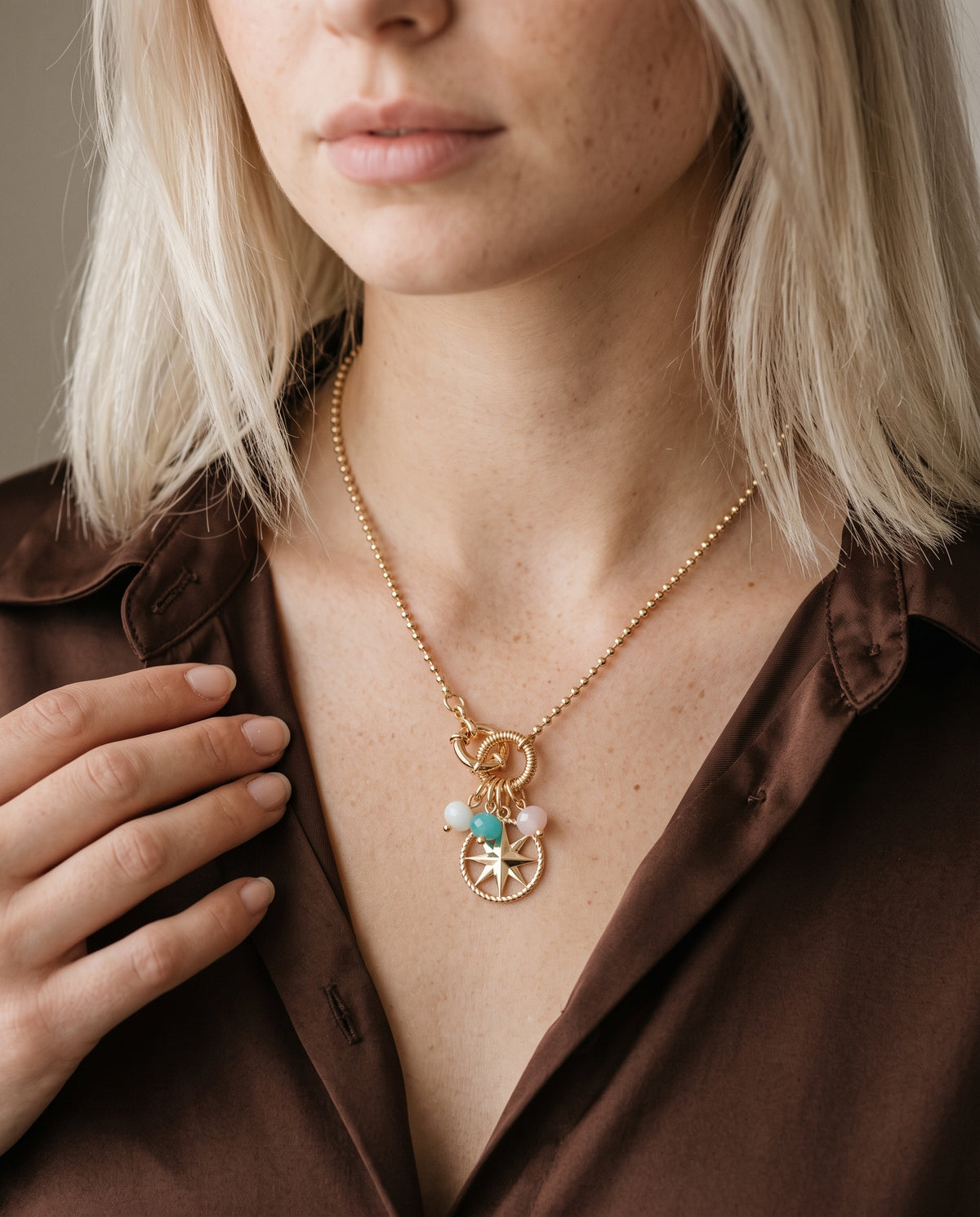 Gold Filled Compass Pendant Necklace worn by a model