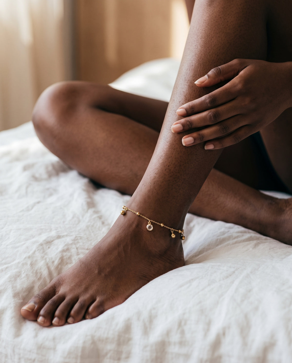 Gold Filled Dangling CZ & Bead Anklet worn by a model