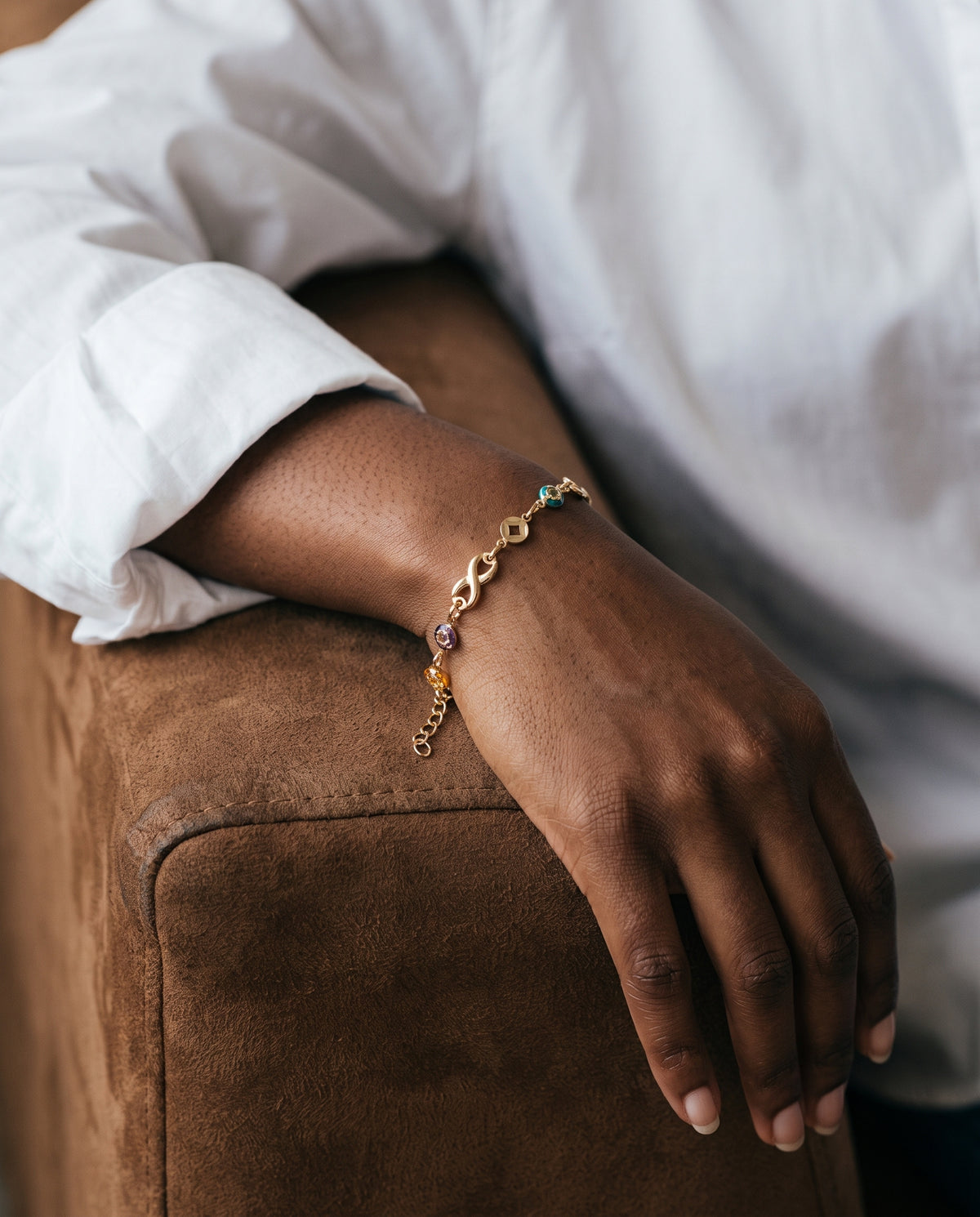 Gold Filled Gemstone Infinity Bracelet worn by a model