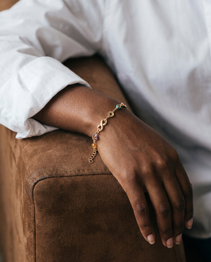 Gold Filled Gemstone Infinity Bracelet worn by a model