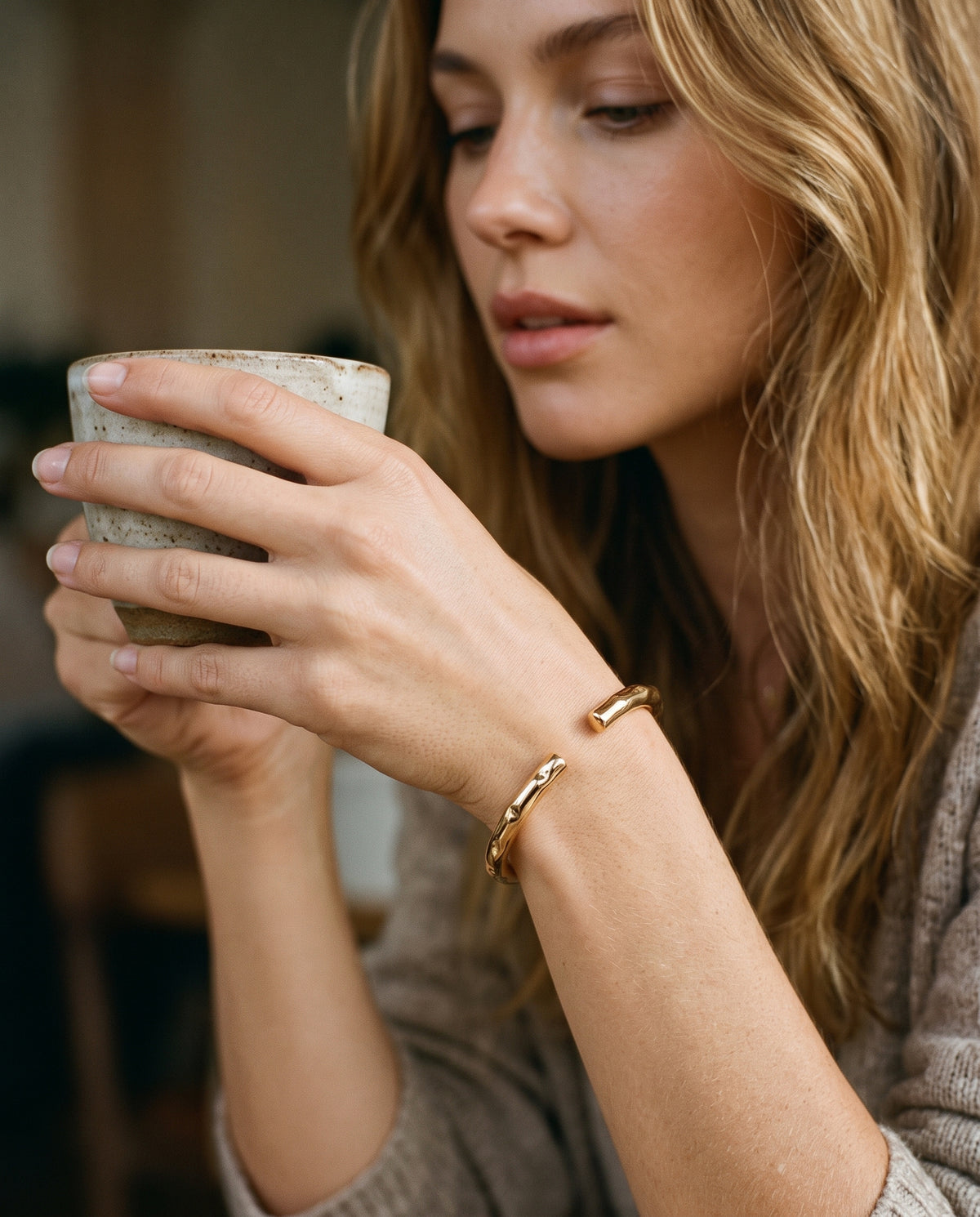 Gold Filled Hammered Bangle worn by a model