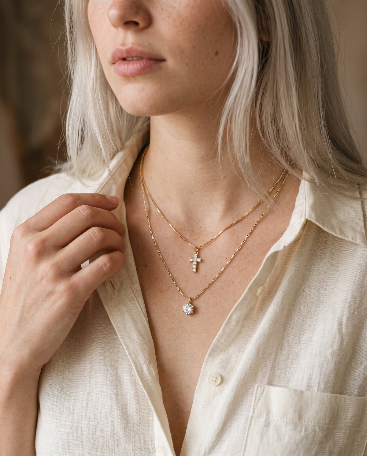 Gold Filled Layered CZ Cross Necklace worn by a model