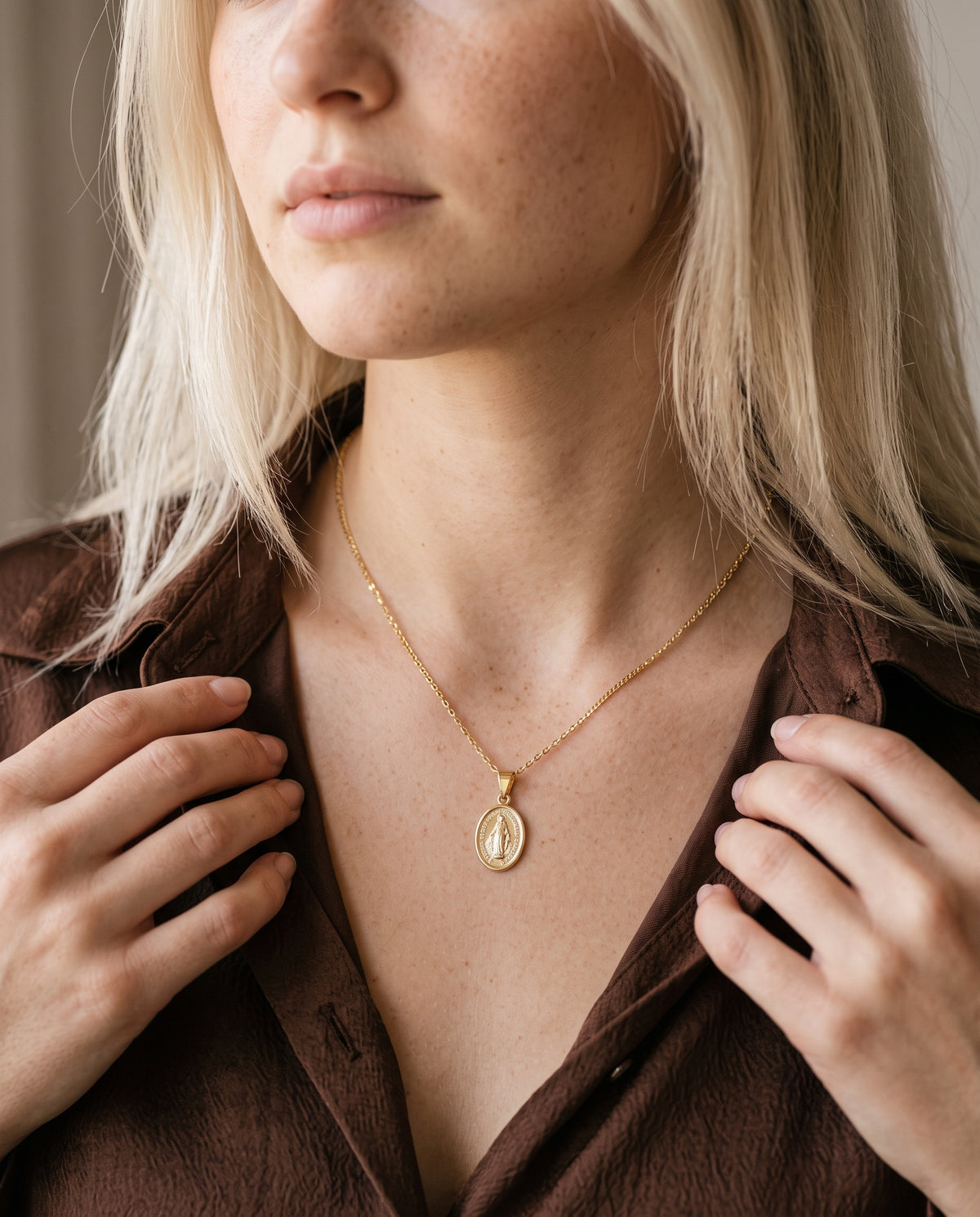 Gold Filled Mini Miraculous Medal Necklace worn by a model