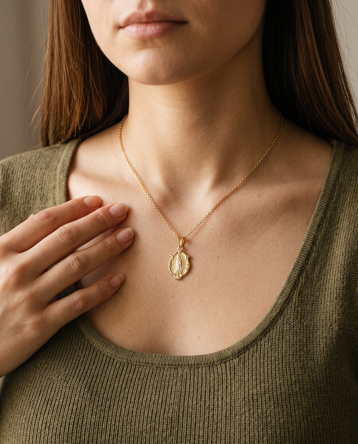 Gold Filled Our Lady of Guadalupe Necklace worn by a model