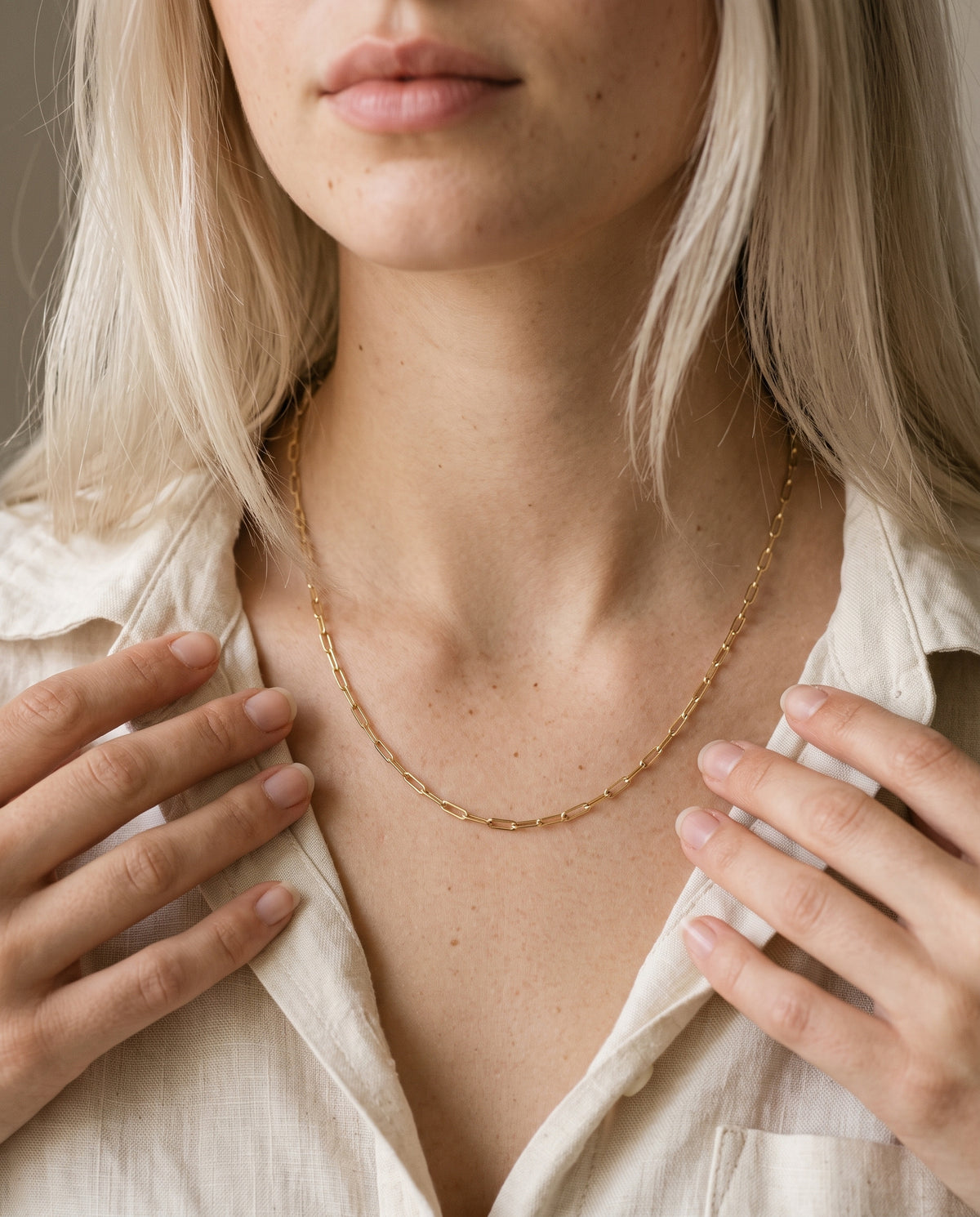 Gold Filled Paperclip Chain worn by a model