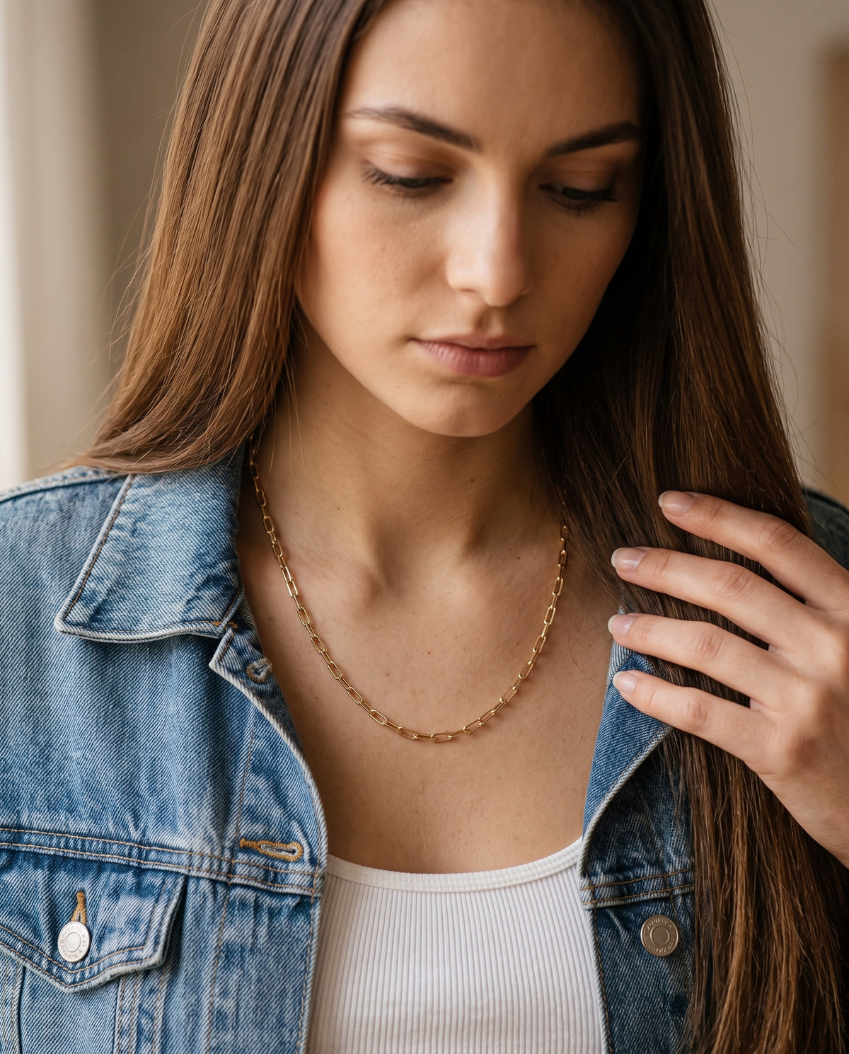 Gold Filled Paperclip Chain worn by a model