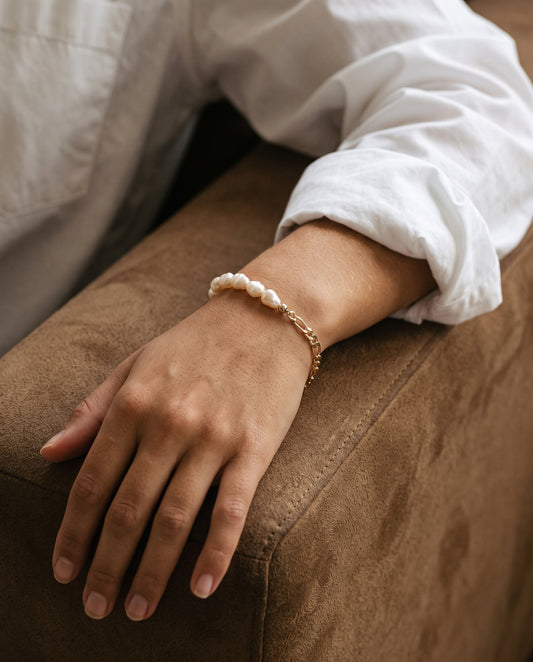 Gold Filled Pearl Figaro Bracelet worn by a model