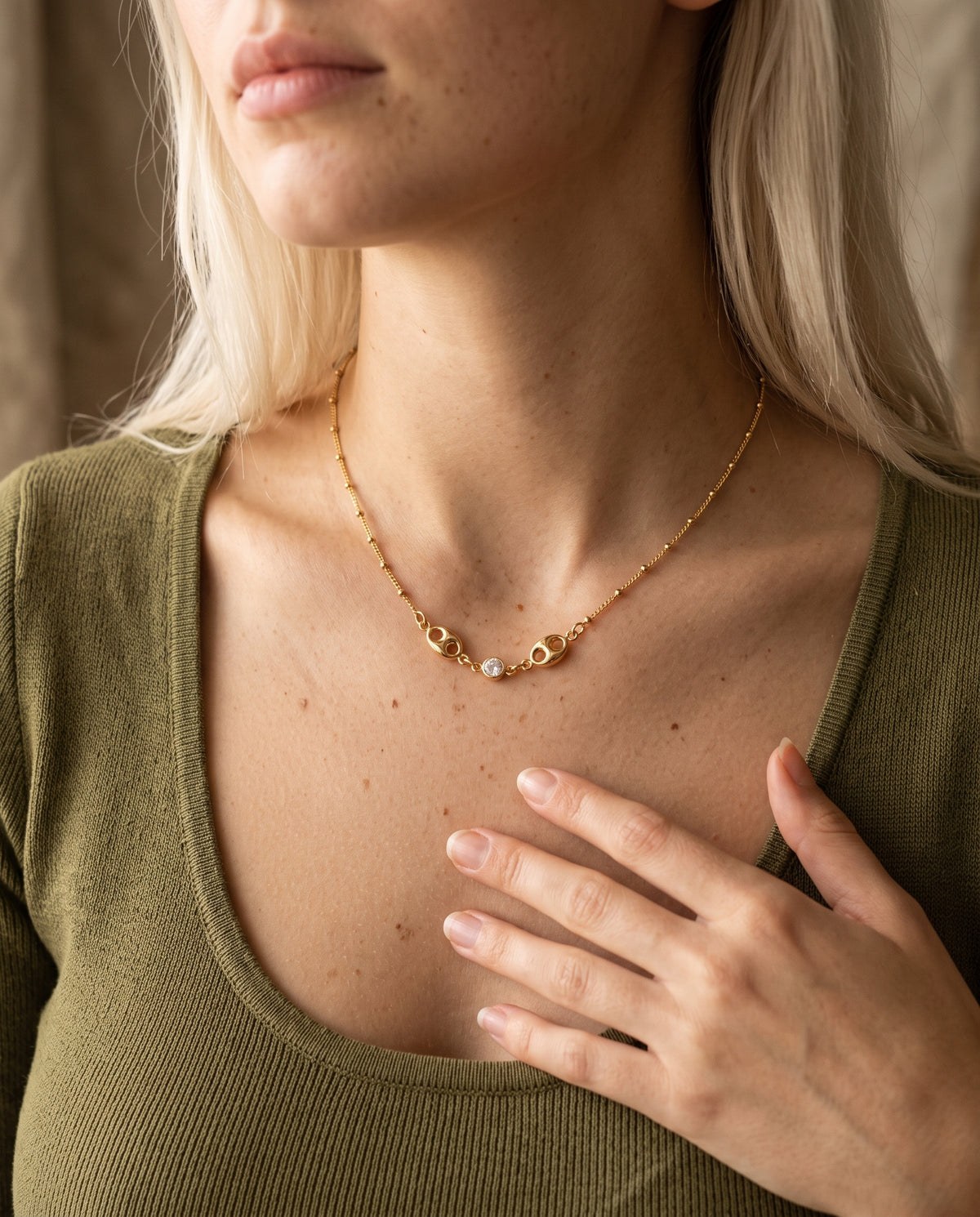 Gold Filled Puff & CZ Necklace worn by a model