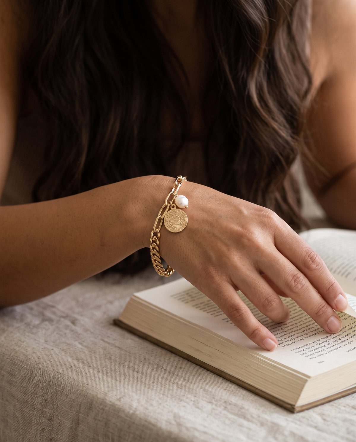 Gold filled mixed chain bracelet with embossed medallion and pearl charm