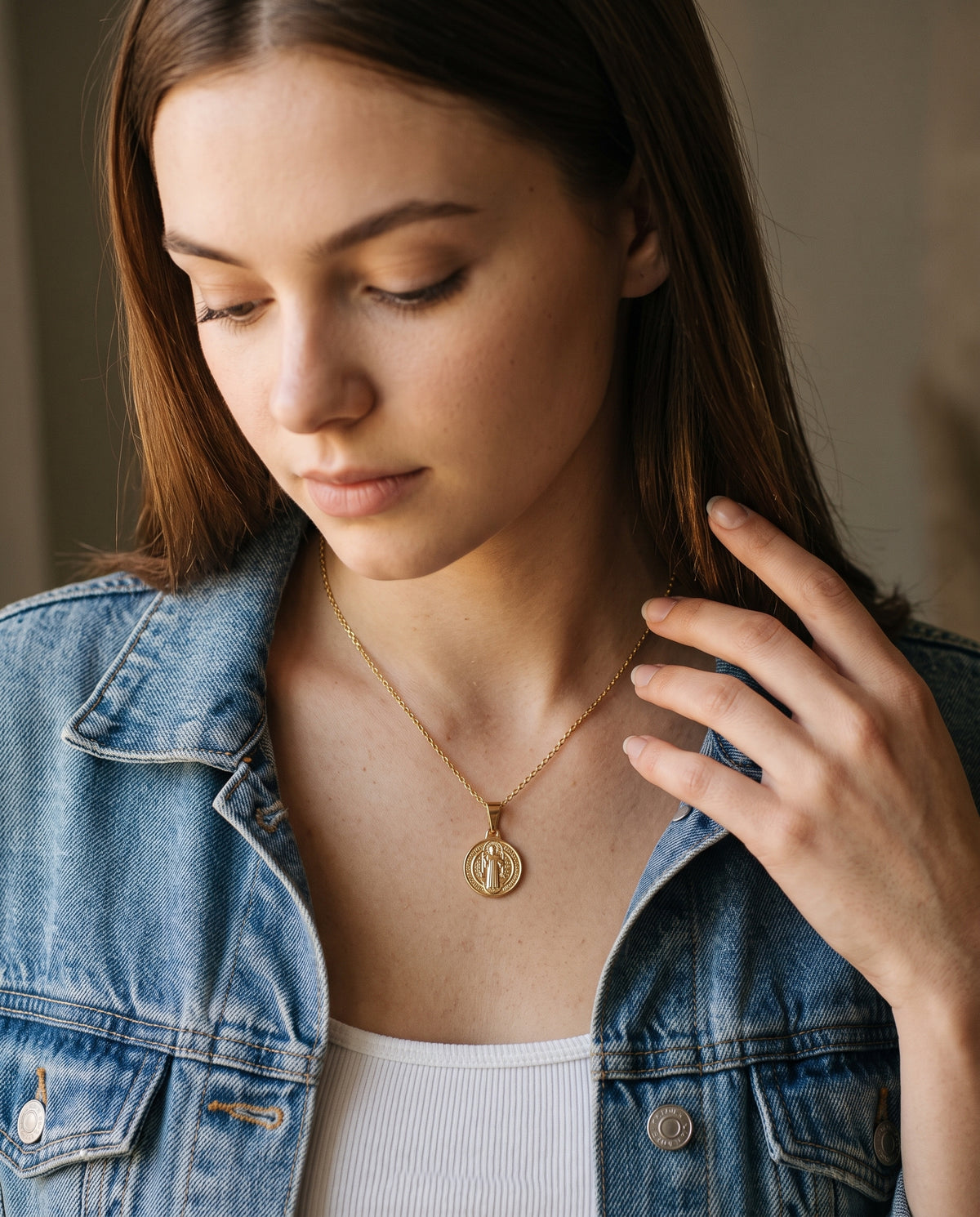 Gold Filled Saint Benedict Necklace worn by a model