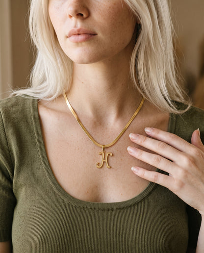 Gold Filled Script Initial Herringbone Necklace worn by a model