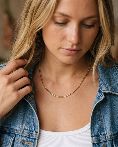 Gold Filled Snake Necklace worn by a model