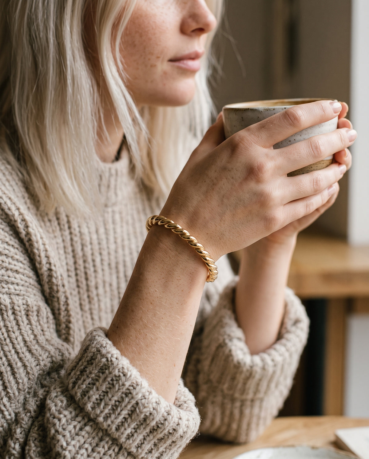 Gold Filled Twisted Bangle worn by a model