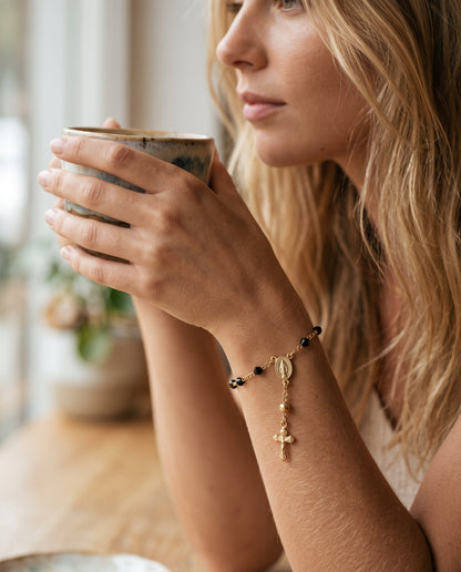 Gold Filled Virgin Mary Black Crystal Rosary Bracelet worn by a model