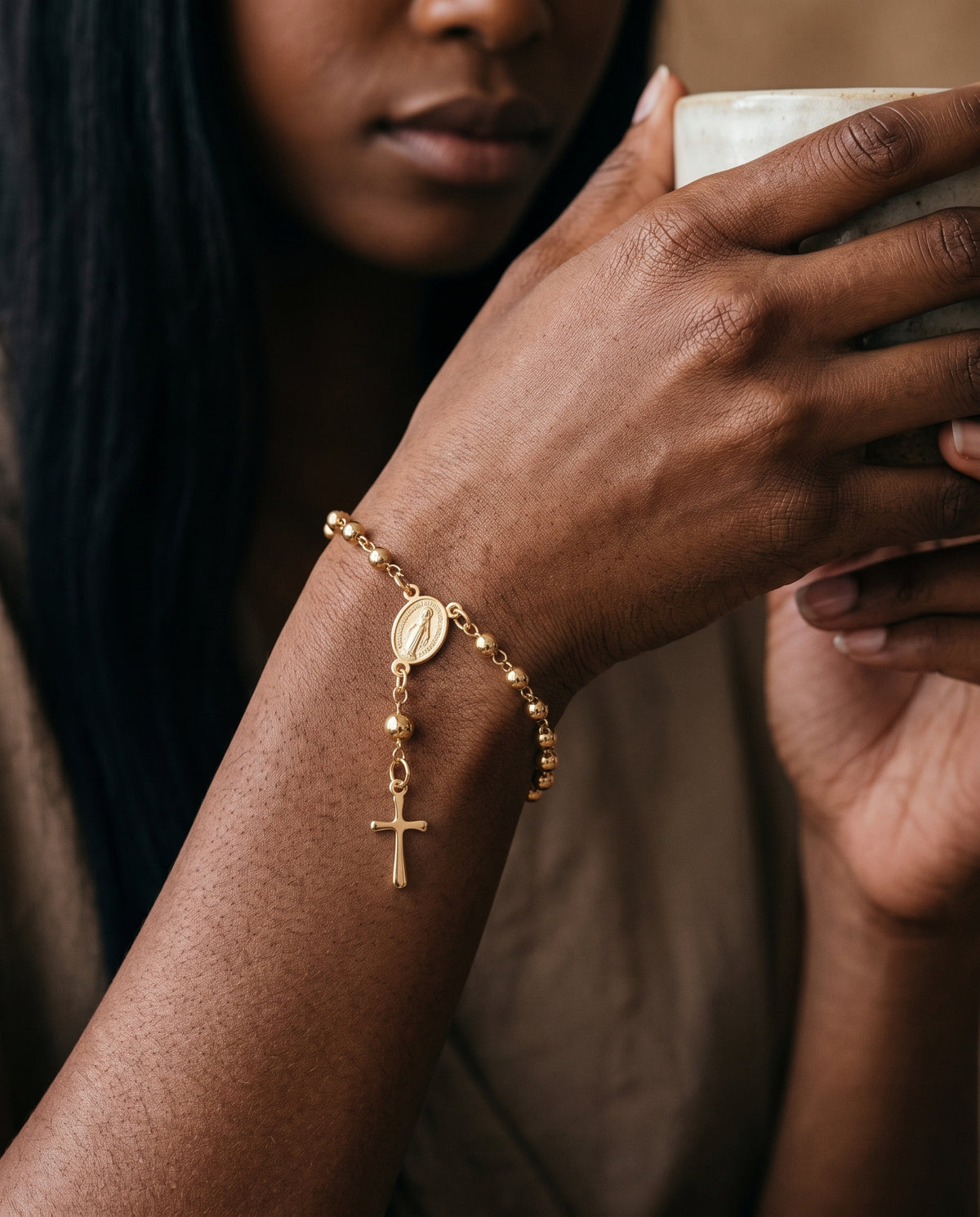 Gold Filled Virgin Mary Rosary Bracelet worn by a model