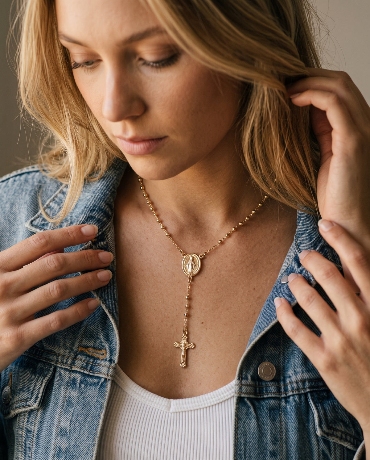 Gold Filled Virgin Mary Rosary Necklace worn by a model